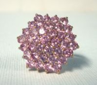 A large 9ct gold pink stone cluster ring size, P