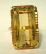 A large 18ct gold ring set with single Citrine, approx 23mm x 14mm, approx 11g, size M