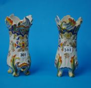 Pair of continental Rouen pottery vases, 20cm t/w Pair of brass candlesticks of antique design,