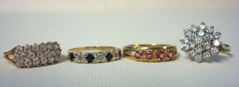 Four 9ct gold dress rings