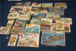 Collection of model kits including army vehicles, aircraft etc (27)