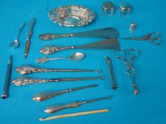 Various small silver objects including pieced and embossed dish, shoes horns, scissors, cigarette