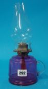 A Victorian cranberry glass chamber oil lamp, 27cm