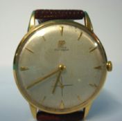 A Gents Girard Perregaux 18ct gold wrist watch with baton numerals and sub second dial, 34mm