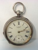 A large silver pocket watch by Waltham