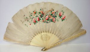 A carved Chinese ivory fan