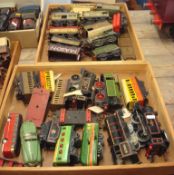 A quantity of Hornby Gauge O model clockwork railways including  several loco`s, wagons and coaches