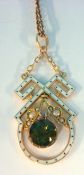 A 9ct gold enamelled pearl and peridot pendant ton fine chain, marked L & Co ( for Liberty)