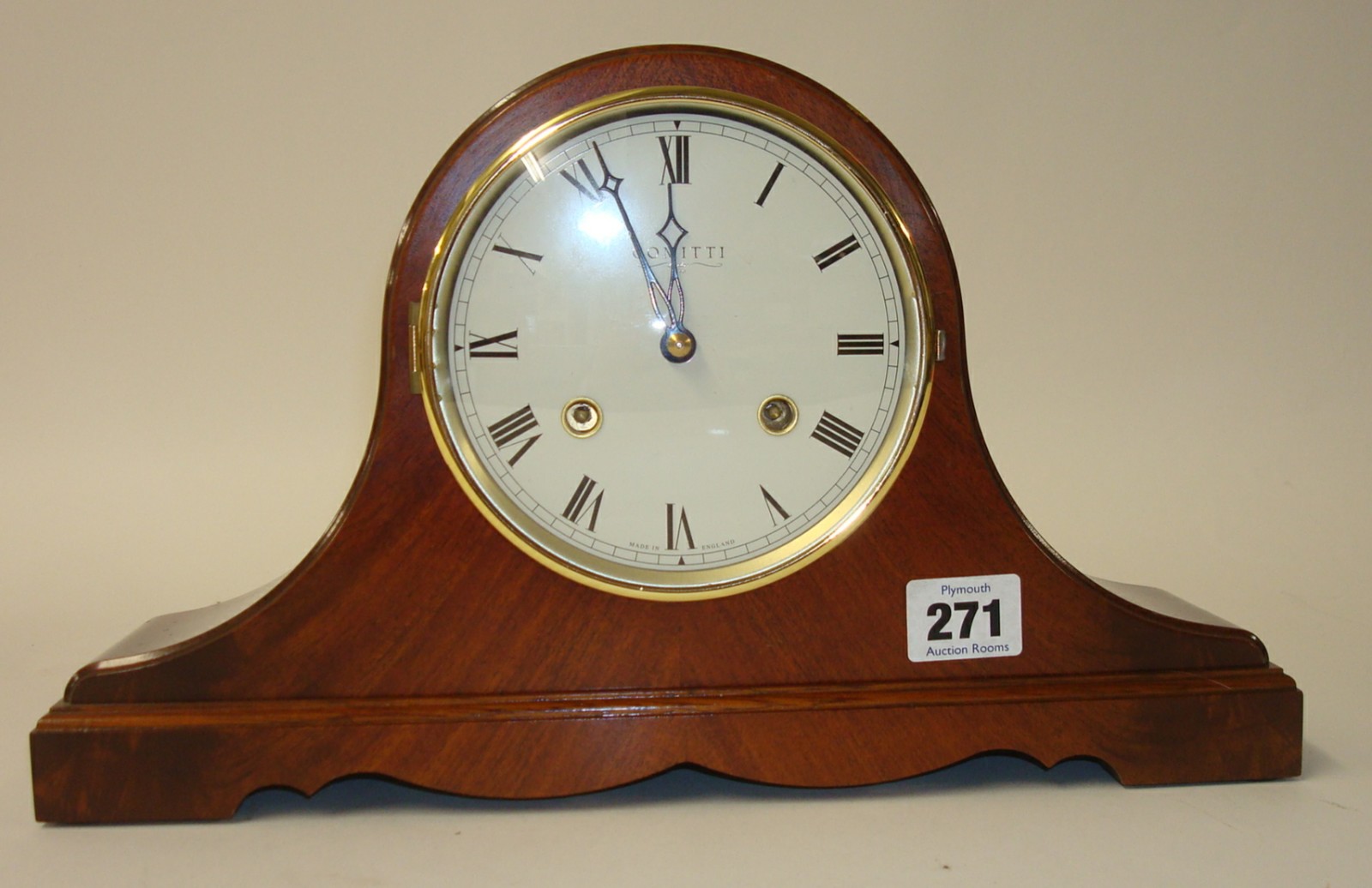 A Comitti mahogany cased mantle clock with bell strike, 20cm high