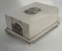 Georg Jensen silver cigar box decorated with panels of stylised flowers, impress marks `Georg