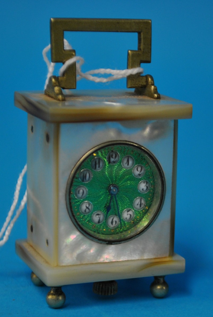 Miniature m.o.p and enamelled carriage clock stamped Brevet 33817, 5cm with handle up