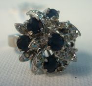Ornate sapphire and diamond cluster ring in white gold, size L