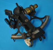 A sextant by Henry Hughes & Son `Husun` label dated 1946 No 51997 in original box with key