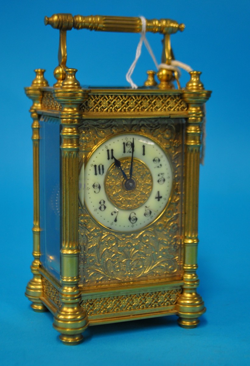 Ornate French brass carriage clock, 16cm handle up with key