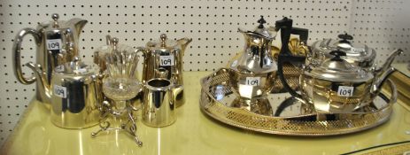 A large collection of silver plated table wares including entrée dishes, pierced baskets, tea