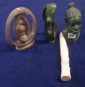 Four African carvings including green verdite