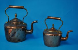 Two Victorian copper kettles (the largest 35cm)
