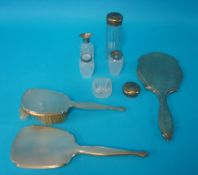 A silver back dressing table wares , toilet jars etc