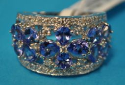 A 14ct white gold tanzanite and diamond band ring, approx 3.00 carat tanzanite weight, ring size M/N