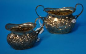 A pair of Edwardian silver sucre and cream jug, approximately 9.32 oz