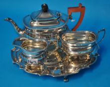 A three piece silver tea service Elkington & Co t/w a silver salver approx 51 oz