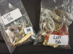 Two bags of various costume jewellery, brooches, bangles, necklaces etc