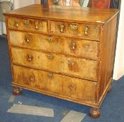 A George I walnut chest fitted with two short and two long drawers, width 95cm