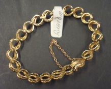 9ct gold bracelet set with diamonds and rubies, 17.6g
