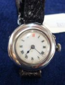 Round silver small wrist watch with red twelve, leather strap