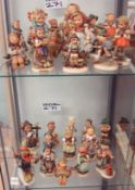 Collection of 32 Goebel Hummell figures