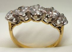 Ladies 18ct gold diamond five stone ring set with five brilliant cut diamonds, one weighing approx