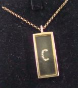9ct gold and diamond set pendant with fine chain