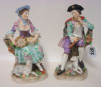 Pair of 19th century Sitzendorf porcelain figures, 20cm high