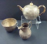 Victorian matched set silver three-piece tea set with hand engraved foliate decoration, hallmarked