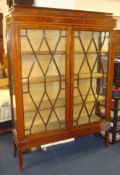 A good Edwardian mahogany and inlaid display cabinet, 122cm wide