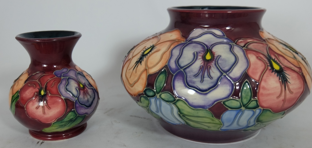 Moorcroft vases decorated in the Pansy design, tallest height 13cm  (2)