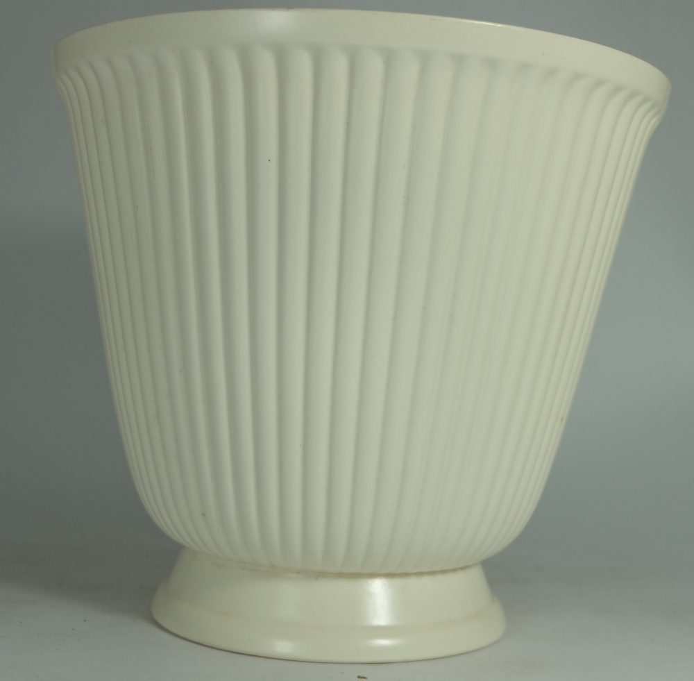 Wedgwood White ribbed footed vase designed by Norman Wilson, height 19.5cm