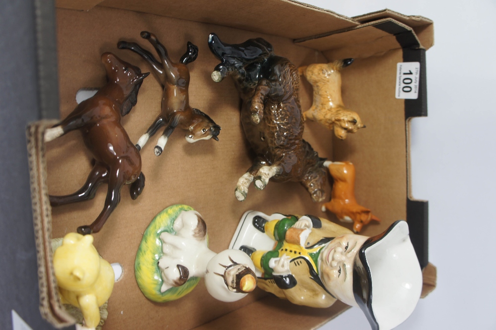 A collection of various Beswick Horses, Dogs , Doulton Winnie the pooh, Woods Toby jug etc (some