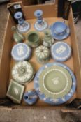A collection of pottery to include Wedgwood candlesticks, cups and saucers, vases, trinket boxes and