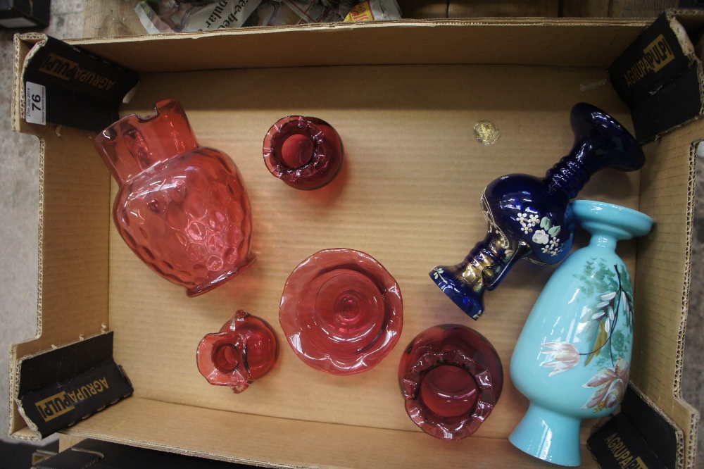 A collection of Victorian and Later Cranberry glass comprising of large jug, vases etc (7)