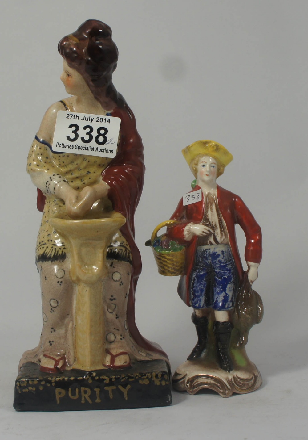 A Reproduction Staffordshire Figure Purity and a Small Unmarked Goebel Figure (2)