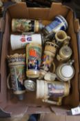 A Collection of Various German Embossed Porcelain Beer Steins with metal mounts and lids (10)