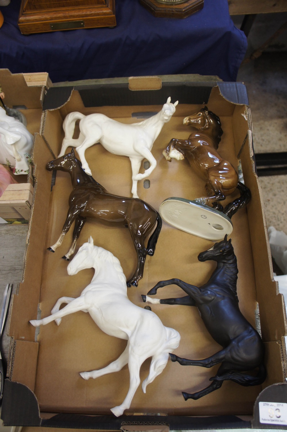 A collection of various Royal Doulton and Beswick horses including Rearing Welsh Cob 1014 (ear re