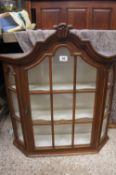 A wooden display cabinet glass doors and side panels 80cm tall x 75cm wide