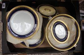 A collection of pottery to include Mintons blue and gilt part dinner service manufactured for
