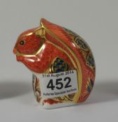 Royal Crown Derby paperweight of a seated squirrel with a gold stopper (orange colourway)
