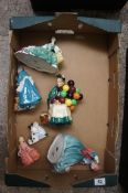 A collection of Royal Doulton figures  comprising Old Balloon Seller, Lady Charmain, The