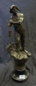 Cast metal figure of a Miner on wood base, height 50cm