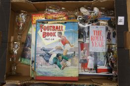 A collection of items to include books, football annuals and a set of five 1953 glasses