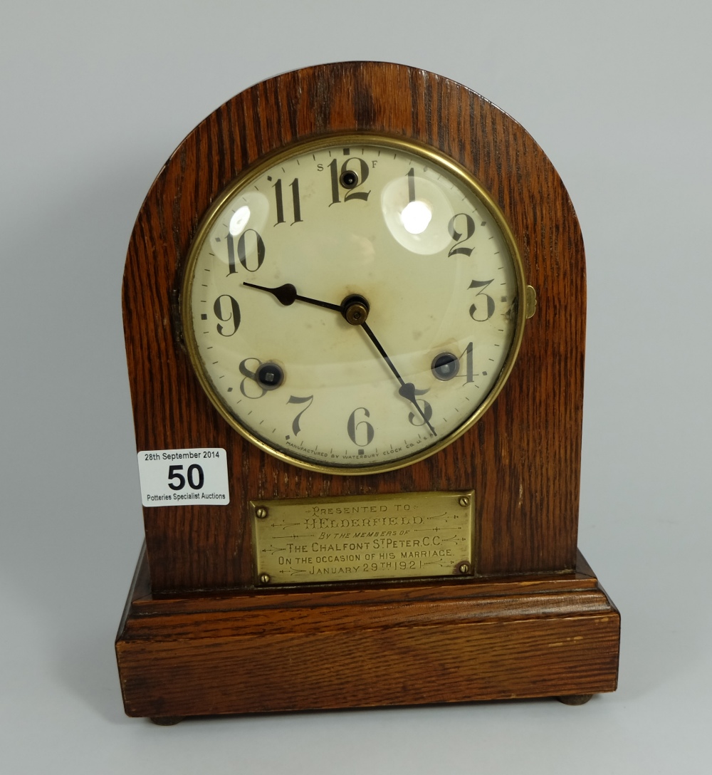 An Oak cased mantle clock Waterberry Clock Co USA, A Marriage presentation plaque dated 1921